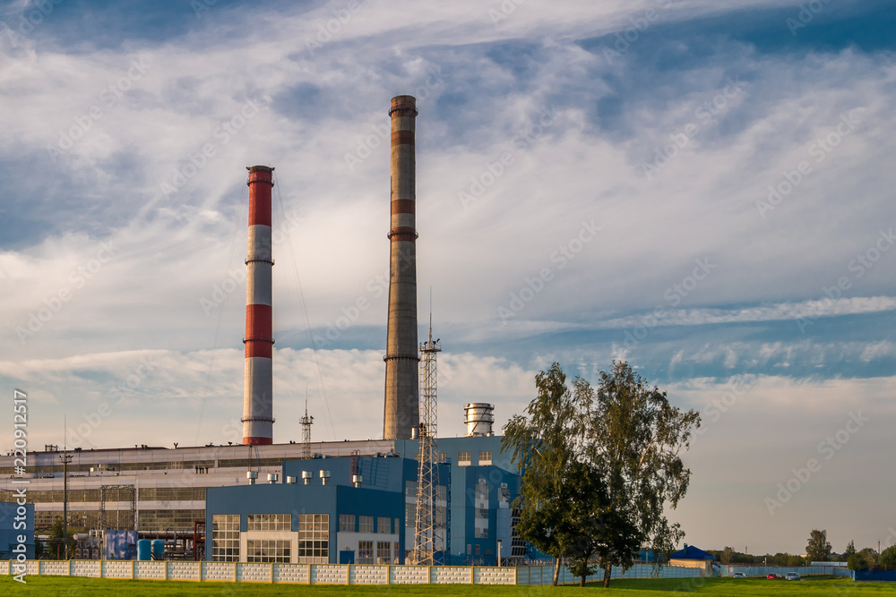 pipes of a chemical enterprise plant. Air pollution concept. Industrial landscape environmental pollution waste of thermal power plant pipes of a chemical enterprise plant. Air pollution concept. Industrial landscape environmental pollution waste of thermal power plant
