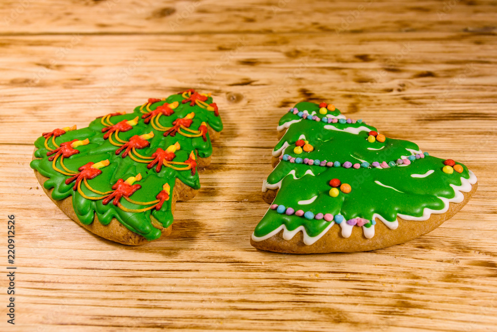Gingerbread christmas trees on a wooden table