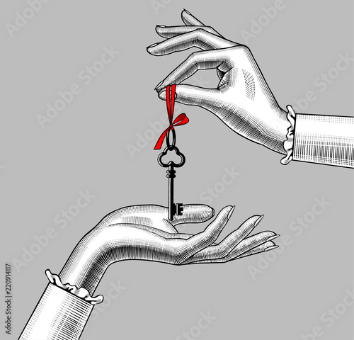 Woman's hands with old key