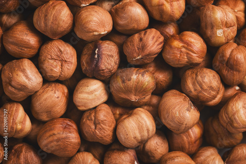 Roasted hazelnuts background top view