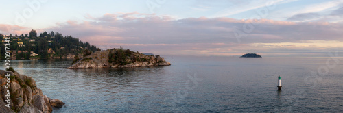 Panoramic landscape view on the Pacific Ocean during a vibrant summer sunset. Taken in Whytecliff Park  Horseshoe Bay  West Vancouver  BC  Canada.