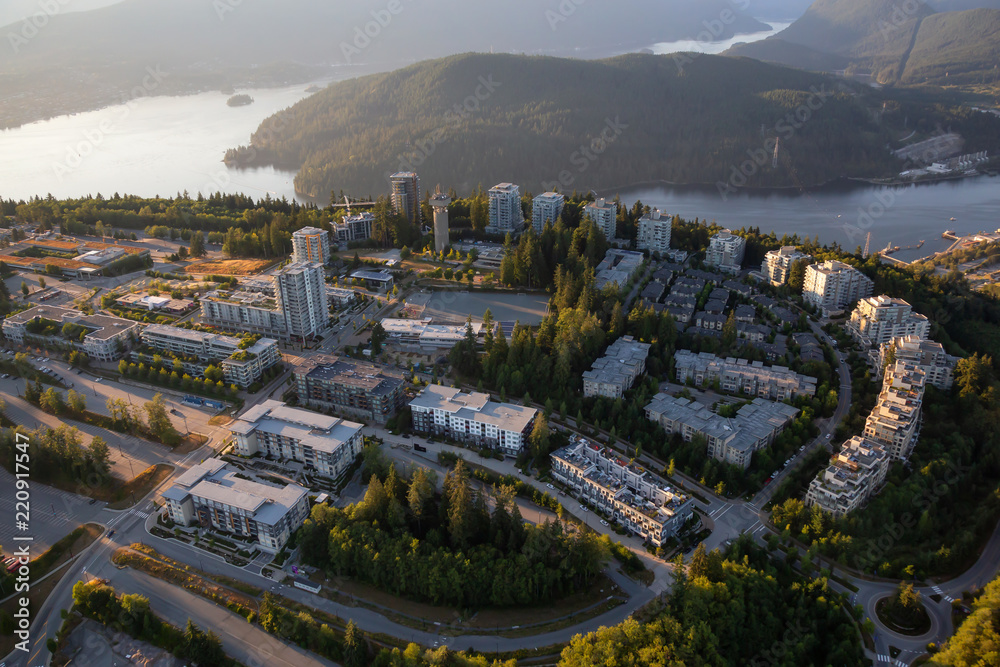 Obraz premium Aerial view of Burnaby Mountain during a vibrant sunny summer sunset. Taken in Vancouver, BC, Canada.