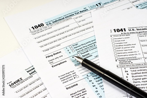 Tax Form 1040 1041 1040EZ and pen