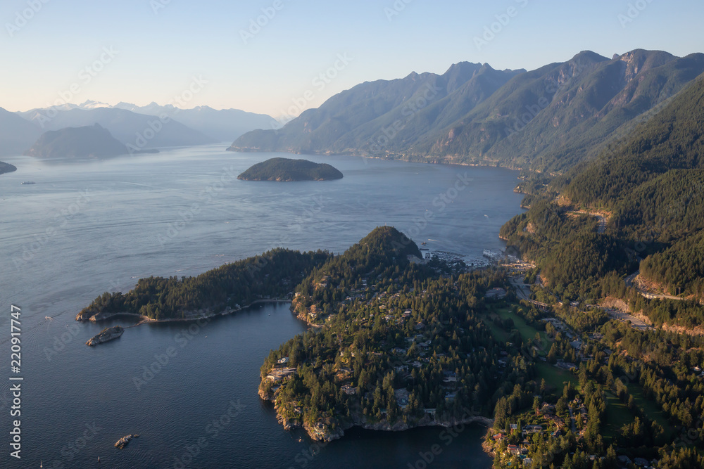 Aerial view of Horseshoe Bay in Howe Sound during a sunny summer evening. Located in West Vancouver, BC, Canada.