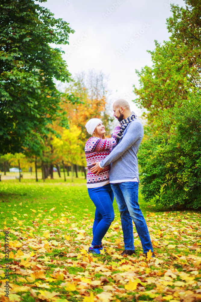 Fototapeta premium happy young couple in the autumn park