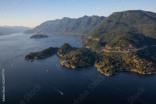 Aerial view of Horseshoe Bay in Howe Sound during a sunny summer evening. Located in West Vancouver, BC, Canada.