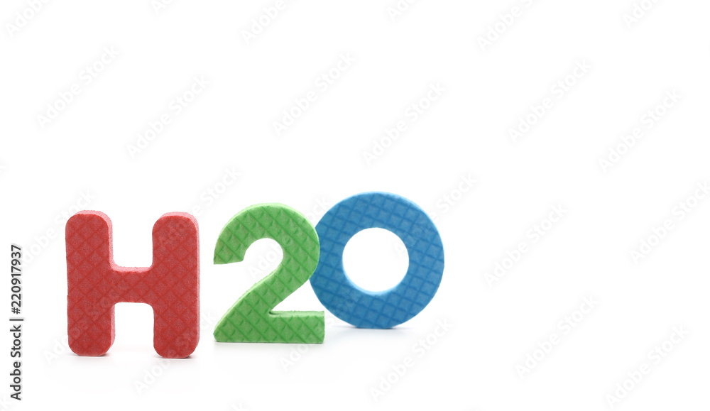 Alphabet letters spelling out H2O, chemical formula for water isolated on white background