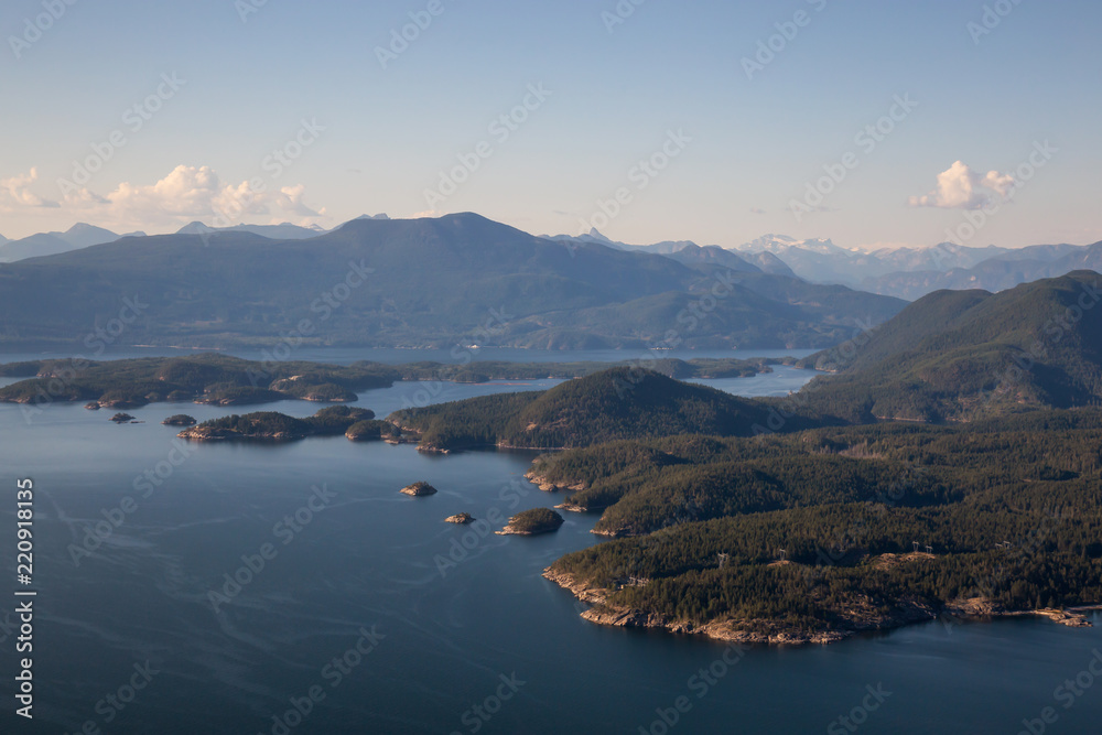 Aerial view of Nelson Island during a sunny summer day. Taken in Sunshine Coast, BC, Canada.