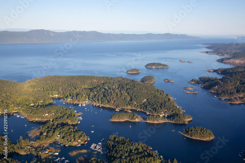 Aerial view of Madeira Park during a sunny summer day. Taken in Sunshine Coast, BC, Canada. photo