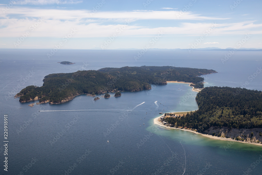 Aerial view of Thormanby Island during a sunny summer day. Taken in Sunshine Coast, BC, Canada.