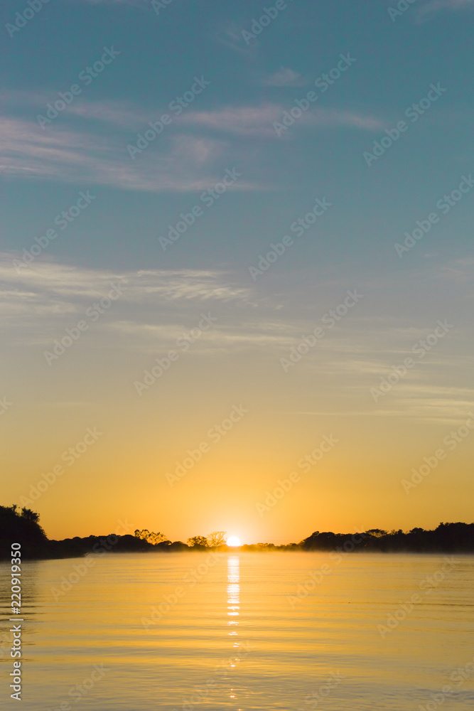Sunrise over River in the Brasil Pantanal