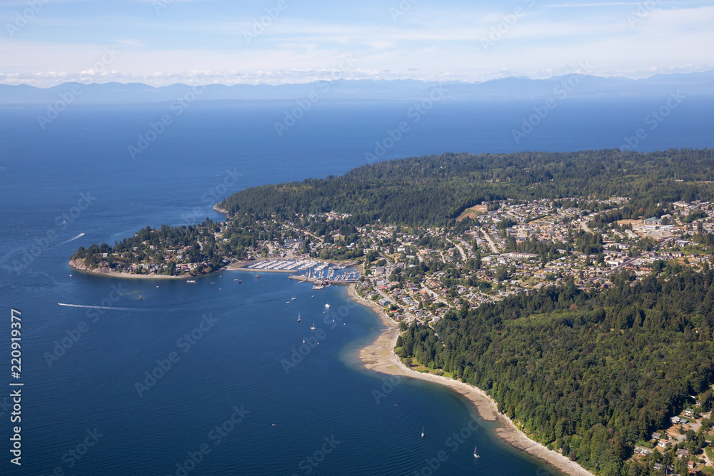 Aerial view of Gibsons during a sunny summer day. Located in Sunshine Coast, Northwest of Vancouver, BC, Canada
