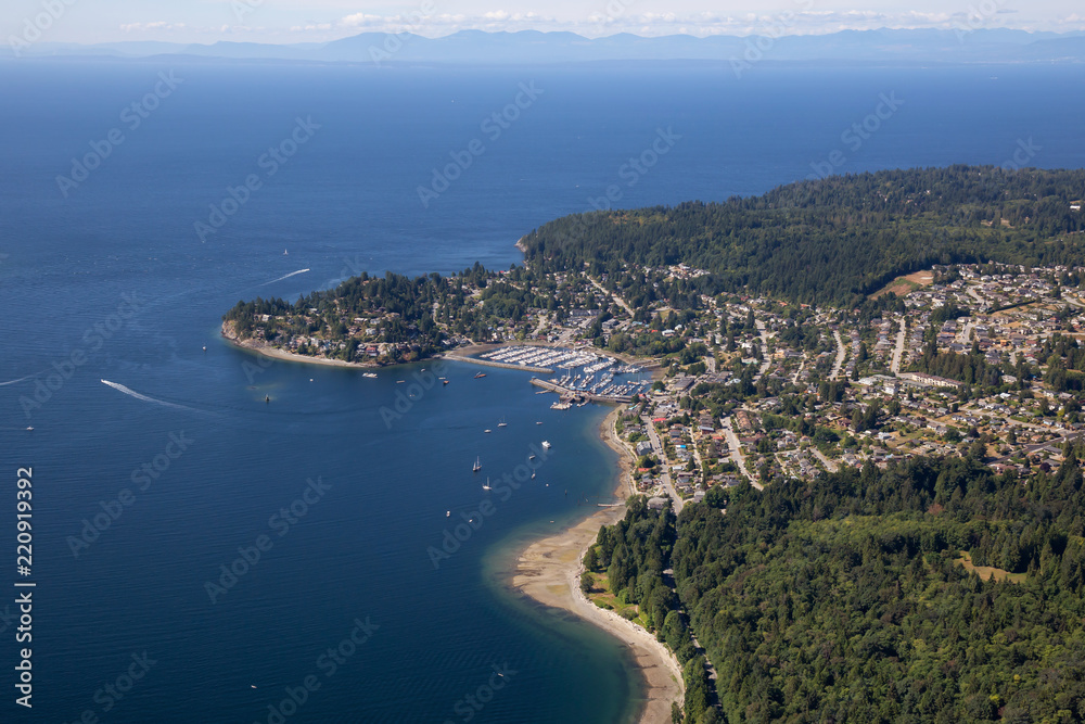 Aerial view of Gibsons during a sunny summer day. Located in Sunshine Coast, Northwest of Vancouver, BC, Canada