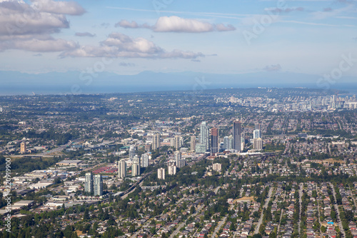 Aerial view of Brentwood Centre with Downtown City in the Background.