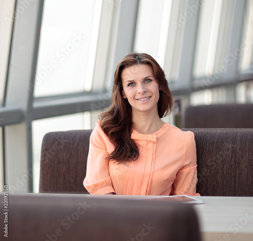 woman consultant in the workplace in the Bank office