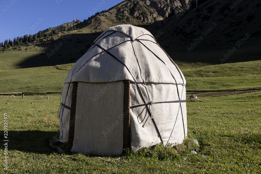 Single traditional yurt in the valley of Altyn-Arashan near Karakol in Kyrgyzstan