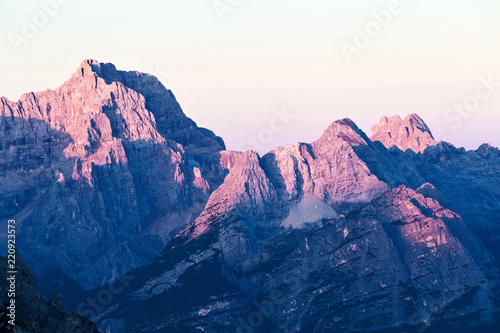 Magical dolomites mountains with pink sunlight