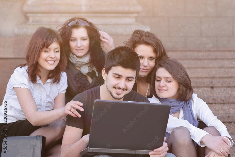 closeup. groups of students with a laptop closeup. groups of students with a laptop