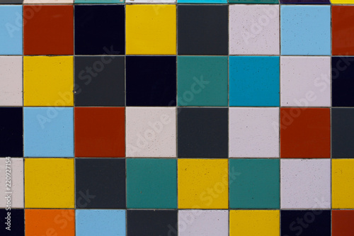 Multicolored ceramic tiles on the wall as background or texture