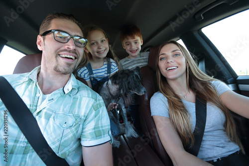 close up. happy family in a comfortable car © ASDF