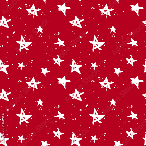 Red and white hand drawn stars and drops seamless pattern. Christmas and New year wrapping