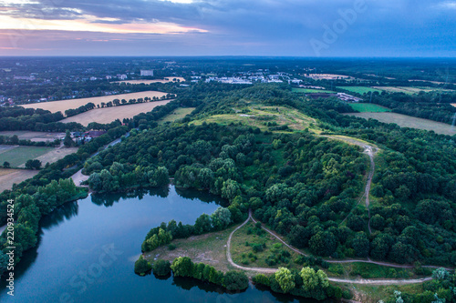 Wallpaper Mural Aerial view of amazing sunset over the park in Germany. Hill and lake from birds eye view.   Torontodigital.ca
