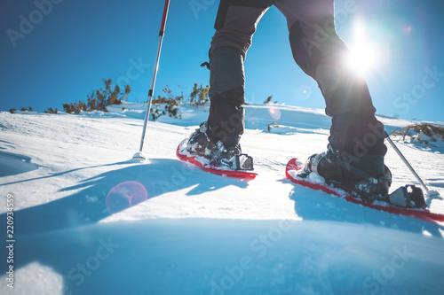 Man in snowshoes.