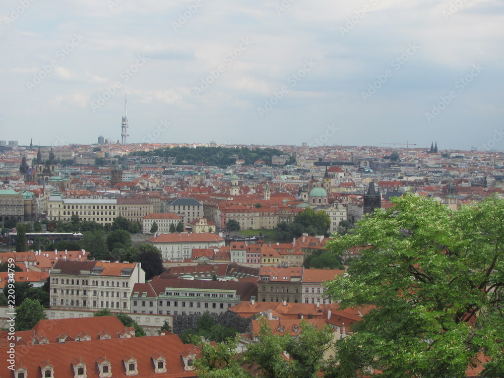 Panorama of Prague, view of the city roofs and domes of churches