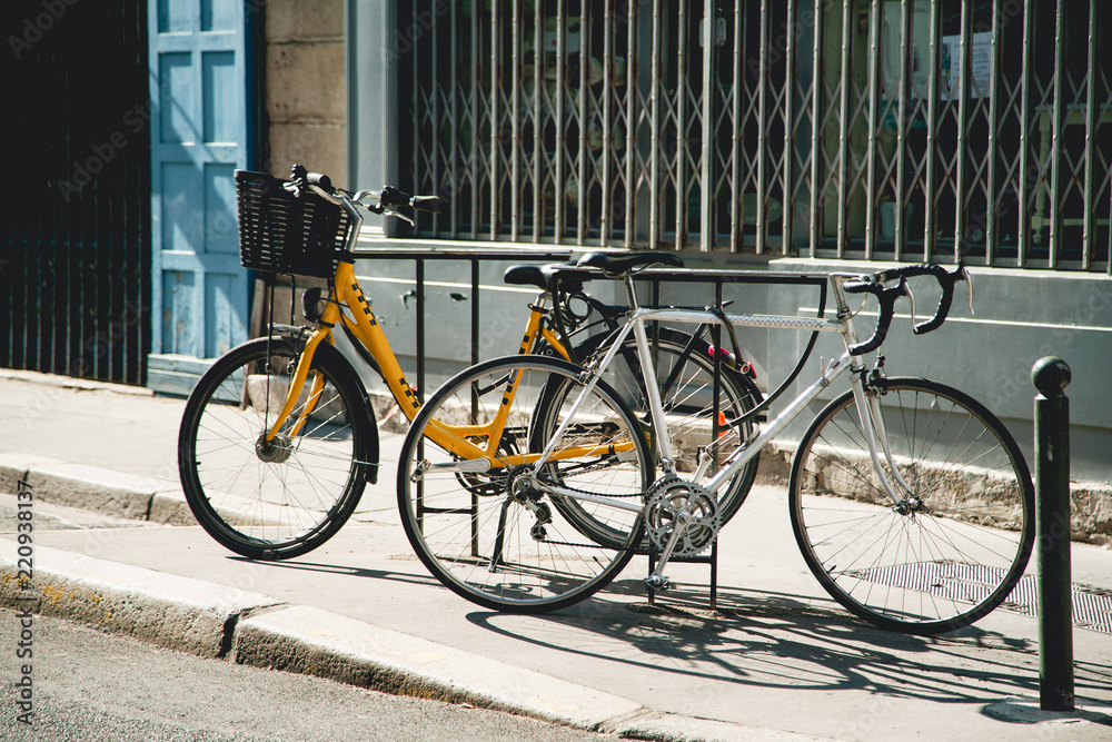 Bycicles parked on a street in european city