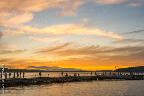 scene of walk way on the lake when sunset in Gene Coulon Memorial Beach Park,Renton,Washington,usa. © checubus