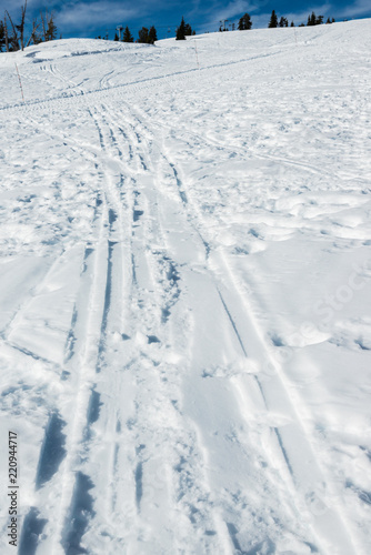 ski track in ski resort area. © checubus