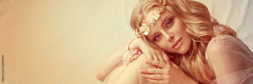 Delicate portrait of a young model girl. The image of the bride, a light lace dress in pink, a beautiful hairstyle and a natural make-up. Light photo studio, natural light from the window. Delicate portrait of a young model girl. The image of the bride, a light lace dress in pink, a beautiful hairstyle and a natural make-up. Light photo studio, natural light from the window.
