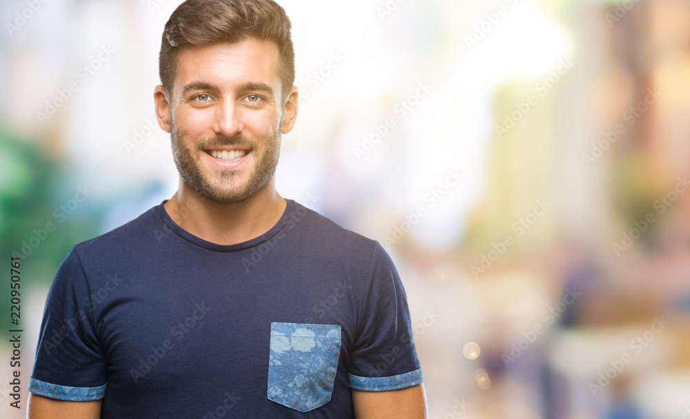 Young handsome man over isolated background with a happy and cool smile on face. Lucky person. Young handsome man over isolated background with a happy and cool smile on face. Lucky person.