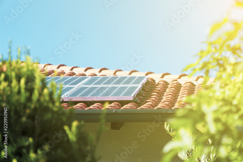 Solar panels on the roof, alternative electricity. photo