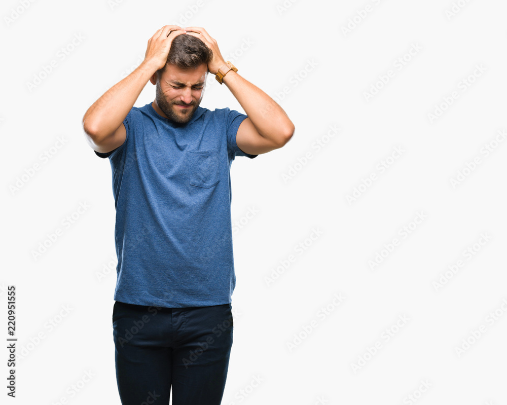 Young handsome man over isolated background suffering from headache desperate and stressed because pain and migraine. Hands on head. Young handsome man over isolated background suffering from headache desperate and stressed because pain and migraine. Hands on head.
