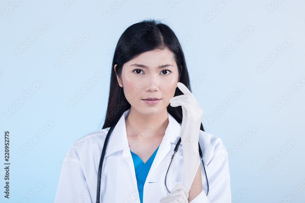 Doctor Nurse in white blue shirt with stethoscope and rubber gloves Doctor Nurse in white blue shirt with stethoscope and rubber gloves