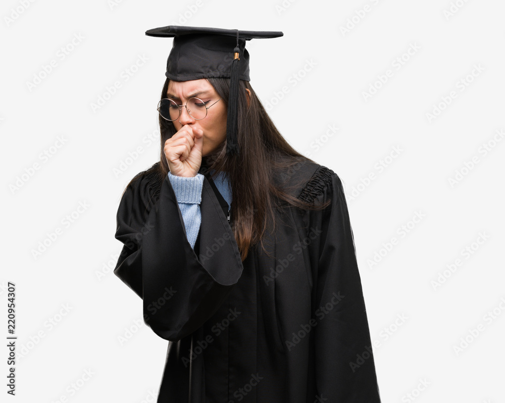 Young hispanic woman wearing graduated cap and uniform feeling unwell and coughing as symptom for cold or bronchitis. Healthcare concept. Young hispanic woman wearing graduated cap and uniform feeling unwell and coughing as symptom for cold or bronchitis. Healthcare concept.