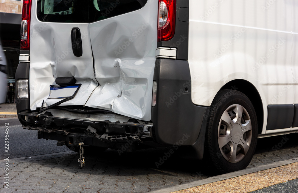 Fototapeta premium White van damaged in a rear-end collision