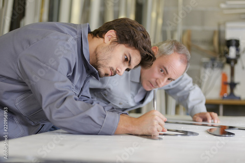 Wallpaper Mural apprentice worker and his master Torontodigital.ca
