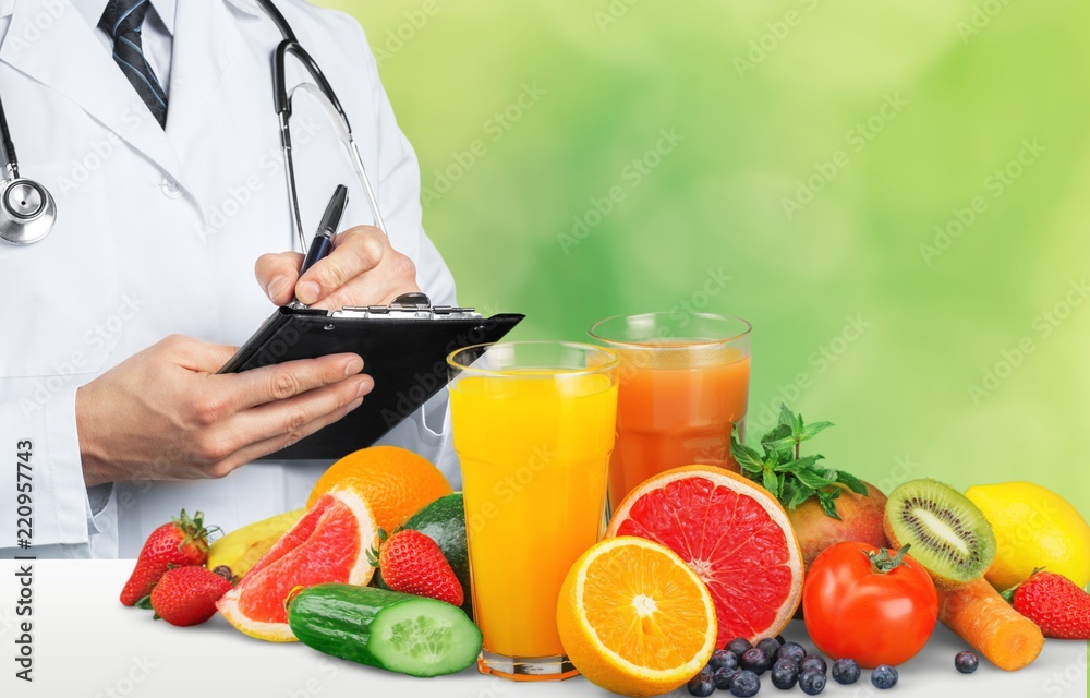 Portrait of doctor with folder and green vegetables and Portrait of doctor with folder and green vegetables and