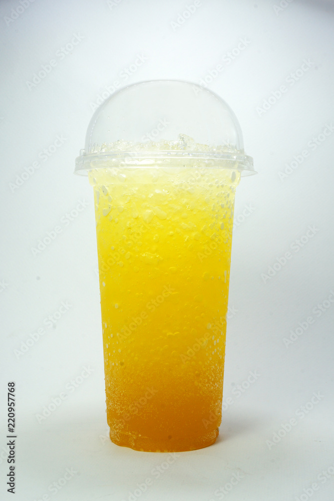 Italian soda Orange soft drink in take home cup beverage for summer isolated on white background,clipping path. Italian soda Orange soft drink in take home cup beverage for summer isolated on white background,clipping path.