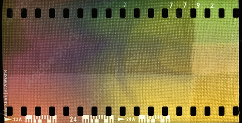 Colorful film strip frame with textured fabric