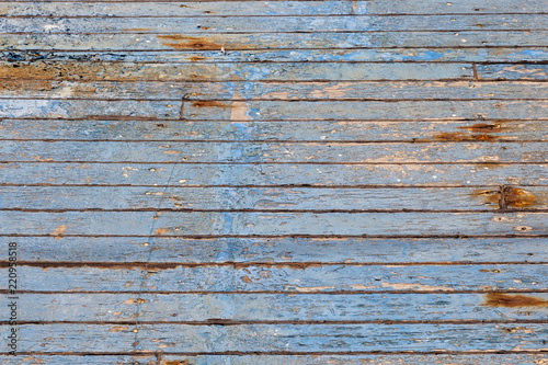pattern of a n old rotten wooden plank in blue