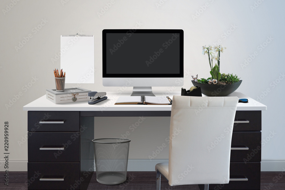 Fototapeta premium office workspace with various items on a desk