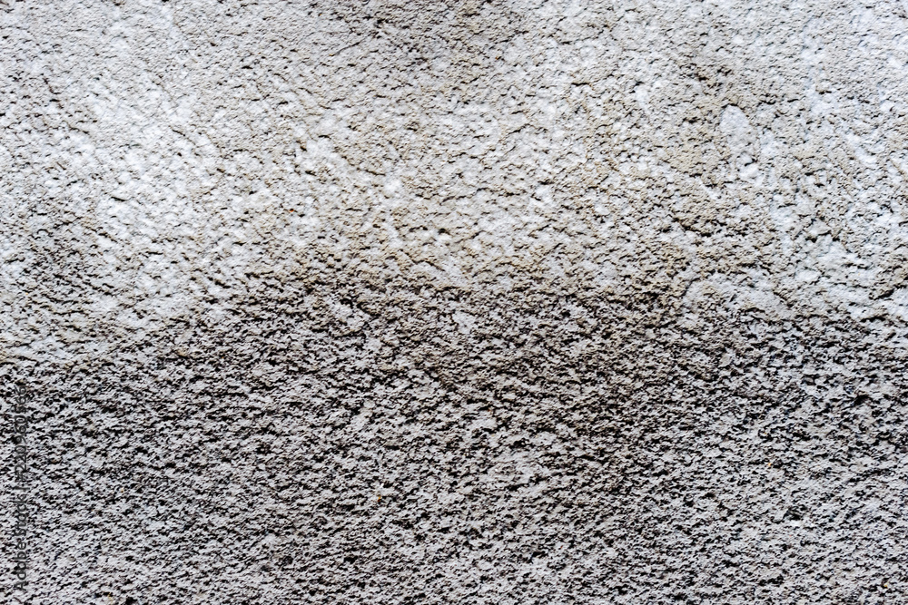 Plastered wall, transition from dark to light Plastered wall, transition from dark to light