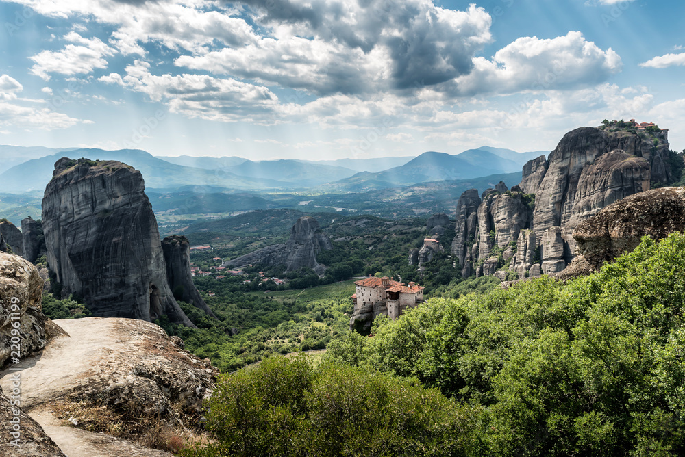 Meteors or Meteora with Orthodox Monasteries, panoramic view from the plateau to the valley of Thessaly