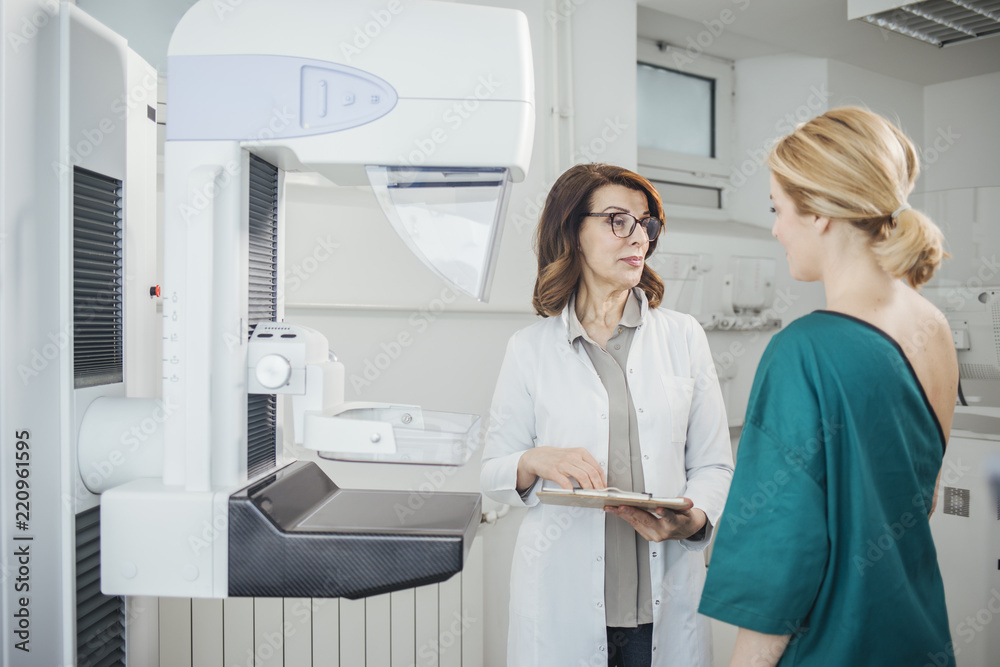 Doctor and Patient on Mammography Examination