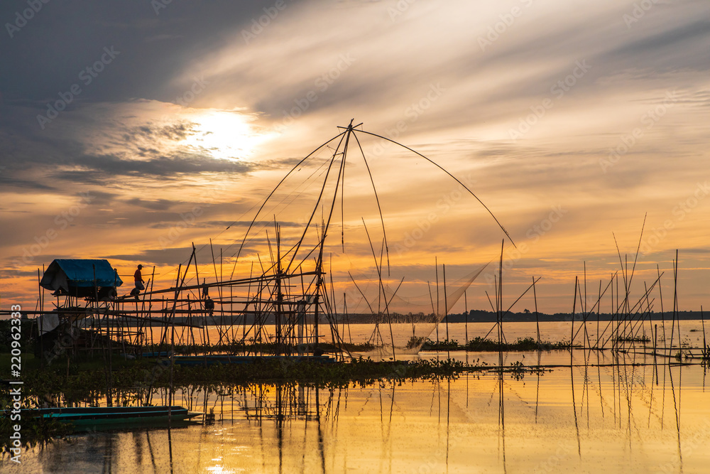 Fishing tools of fisherman in the morning at Huai Luang dam, Udonthani province, Thailand. Fishing tools of fisherman in the morning at Huai Luang dam, Udonthani province, Thailand.