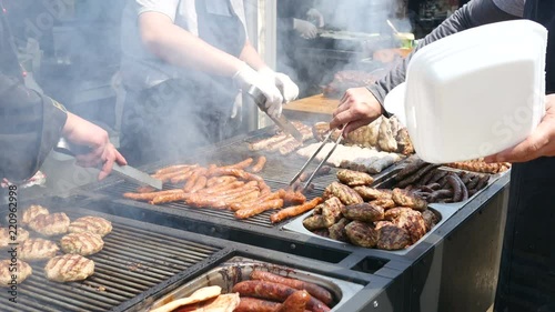Grilled pork and chicken meat, lamb roasted on a spit - street food festival