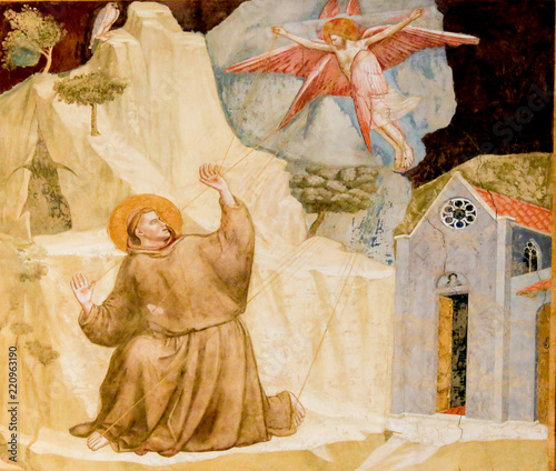 Famous Painting by Giotto of Saint Francis Receiving the Stigmata in the Bardi Chapel, Santa Croce Basilica, Florence, Italy photo